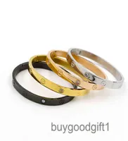 العلامة التجارية Carti Bracelets Luxury Modesieraden Lover Paar Armband Roestvrij Staal Gouden Kleur Kruis Schro 52ZB4503323