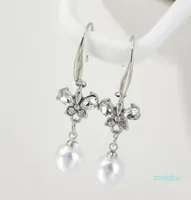 Ez1888 fashion accessories Korean long Butterfly Pearl with diamond temperament Earrings women039s beads3891261