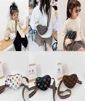 Children Love Heart Bags Bolss Pu Leather Mini Totes Travel Kids Bags Bolsas para niñas Lindo Purse Fashion Pack Pur7001981