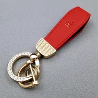 Cadeia de couro de couro de metal de luxo Pingente de pingente dividido Ring Ring Ring for Woman Man Man Strap Moda Acess￳rios para Keyring