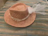 Berets 202204-shi Drop Summer Designer Pink Natural Treasure Grass Weaving Pearl Streamer Fedoras Cap Women Panama Jazz Hat