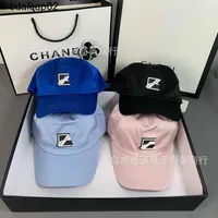 Premium version wE letter box rubber baseball cap duck tongue Deng Lun's same fashion couple style spring and summer