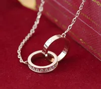 Collier de mode Designer Jewelry Party Gold Chain Titanium Steel Double Anneaux Diamond Pendant Colliers Femmes Bijoux de No￫l ￠ longue cha￮ne Cadeau avec bo￮te