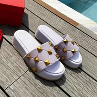 Fashion slippers for woman summer new rivet platform muffin designer slippers women's leather outside wear wedges beach casual flip-flops