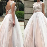 Sukienki imprezowe 2022 Romantyczne tiulowe balu z krótkimi rękawami koronkowe aplikacje długość podłogi formalne suknie wieczorowe