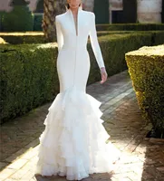 Eleganckie sukienki ślubne syreny z kości słoniowej długie rękawy puste tylne guziki Syborki Głębokie w V-dół Seksowne proste wiosenne sukienki ślubne 2023 szata de Mariee