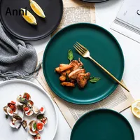 Piastre ceramica creativa nordica moderna semplice glassa solida glassa rotonda bistecca di pasta per cena tavoli da cucina per la casa
