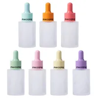 30 ml leere Verpackungsflaschen Gefriertes Glas -Tropfen -Flasche Kosmetische Stamml￶sung L￶sung Essenz ￖlprobe Umpacken kosmetischer Beh￤lter mit rosa blau gr￼nem Gummikopf