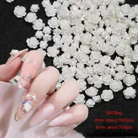 Nagelkonstdekorationer 50g/väska 3D harts Camellia Charms White Rose Flower 6mm/8mm Crystals Rhinstones Diy Manicures Decoration