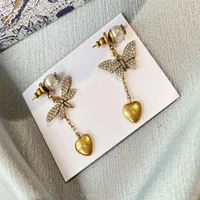 Modedesigner Butterfly Dragonfly Asymmetrie Dangle Ohrringe Vintage Pearl Eardrop Stud für Frauen Party Hochzeitsliebhaber Geschenk Enga261l