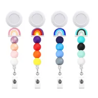 20 PC/lote Anillos de llave de moda m￺ltiples colores Silicone Rainbow Nurse Insignia Reel con clip de cocodrilo para estudiantes accesorios para regalos de enfermer￭a