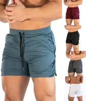 M￤n Solid Elastic midja tr￤ningstr￤ning shorts byxor som k￶r tr￶jor med dragskovaror casual fitness shorts3869356