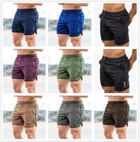 2021 Mannen Running Shorts Sport Gym Compressie Telefoon Pocket Slijtage onder basislaag Korte broek Athletic Solid Panty 6830216