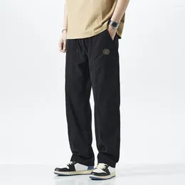 Pantaloni da uomo uomini in poliestere in poliestere cargo in stile retrò con tasche in vita elastica a gamba larga comoda elegante per tutti i giorni