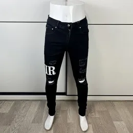Erkek kot pantolon yüksek sokak moda erkek siyah renk elastik streç sıska yırtık marka yamaları tasarımcı hip hop pantolon hombre