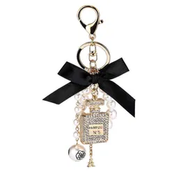 2022 Imitation Pearl Perfume Bottle Keychain Car Key Ring Holder Bag Charm Pendant Accessories Bow Key Chain Fashion Keyring AA2204255254