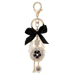 Keychains Imitation Pearl Perfym Crystal Bottle Iron Tower Chain Keychain Car Key Ring Bag Charm Accessories Bow Women Girl Keyri4872717