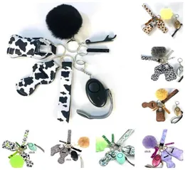 30 ألوان 9pcssets مجموعة المفاتيح مجموعة المنبه Pompom Pompom Hand Hand Lrist Strap Shipstick keychains bottion for woman men se5546303