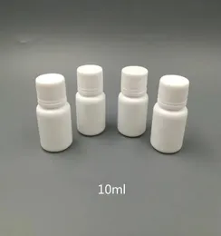 Bottiglia 100pcs 10 ml 10cc da 10 g bottiglie di pillola di piccoli contenitori di plastica con coperchi del tappo di guarni