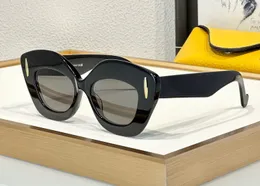 مصمم أزياء شهير 40127 نظارة شمسية للنساء الرجعية أسيتات نظارات العين الصيفية الصيفية على غرار الشخصية ذات الجودة العليا لمكافحة الأسلحة مع حالة