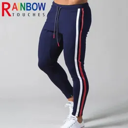 Calças novas calças esportivas dos homens de fitness collants absorção suor jogging listrado calça esportiva dos homens correndo calças homem arco-íristouches