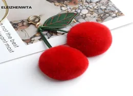 Keychains lyxiga riktiga päls boll pompom cherry y nyckelchain smycken tillbehör kvinnor väska handväska charm chaveiro gåva för HER9097924