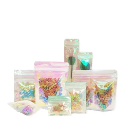 Paketleme çantaları 100pcs alüminyum folyo hologram çantaları kendi kendine gıda depolama çantası yeniden satılabilir kese ambalaj malzemeleri jcmnm