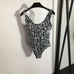 Kvinnors badkläder Summer Shenzhen Nanyou Fanjia Full Body Letter Tryckt Sexig öppen baksida baddräkt (med bröstkuddar)
