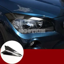 ملحقات ألياف الكربون ألياف المصباح الأمامي غطاء الحواجب تغطية تقليم 2pcs لـ BMW X1 E84 20102015