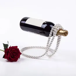 Colar de pérola Rack de vinho suspensa suspensão portador de garrafa de casa decoração de desktop decoração de luxo Magic Metal Resin 240104