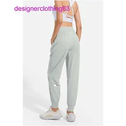 Capris Lululemens Womens Ll Women Jogging Yoga Ninth Pants Pocket Fiessレギンスソフトハイウエストヒップリフトエラスティックカジュアルドローストリングレギー