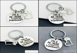 キーチェーンファッションアクセサリー10pcステンレススチールチャーム女性バッグキーリングホルダージュエリーIm A Nurse Pendant Keychain Hospital DA8789383