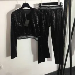 Piece Pants and winter new letter ribbon waist closing sequin waist revealing long sleeve top+elastic thin bottomed trousers