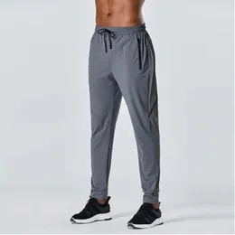 Yeni Erkek Spor Pantolonları Fitness Eğitimi Hızlı kurutma pantolonları Erkek Dağcılık Boş Zaman İnce Fit Pantolon