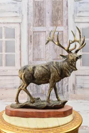木製ベースの驚くべき大きな鋳鉄製の鹿の狩りの置物鹿鹿のro音家と庭の装飾狩りの贈り物のアイデアユニークな彫像