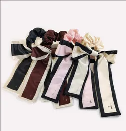 4 farben Designer Doppel Buchstaben Drucken Blumen Bowknot Dickdarm Haar Krawatten Seil Frauen Scrunchies Haarbänder Elastische Gummi Ban7293417