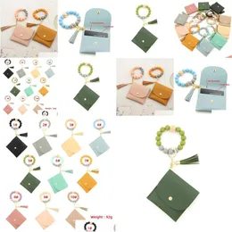 기타 축제 파티 소모품 파티 Sile Beads 팔찌 열쇠 고리 지갑을위한 지갑 열쇠 사슬 뱅글 뱅글 Tassel Wristlet Strap Ca dho5f