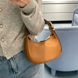 2024 Nouveau sac croissant Designer en cuir véritable sac à main à glissière bandoulière amovible couleur unie sac à bandoulière unique M2061