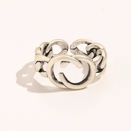 Kvinnors silverring lyxdesigner smycken par ring koppar legering mode smycken varumärke designer kärlek present ring unisex