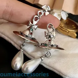 2024 Designer Xitai Queenjewellery Saturn Ufo Pearl Three Dimensional Planet Water Droplets Tassels 925 Silver Needle Earrings Advanced Sense Female