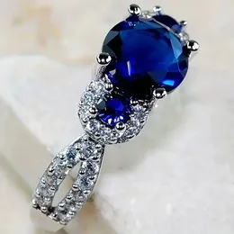 Cluster-Ringe CAOSHI Mode Damen Fingerring mit leuchtend blauen Zirkonia Silber Farbe Verlobungszeremonie Schmuck Trendige Party-Accessoires
