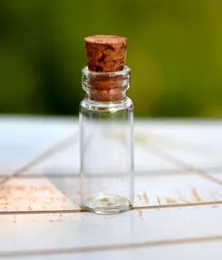 Whole Whole 100pcslot 05ml Tiny Clear Glass Refillable Bottles with Cork Plastic Caps as Essential Oil Empty Vial4465306