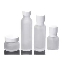 Bottiglie di imballaggio Bottiglie di imballaggio Barattolo di vetro smerigliato Crema per lozione Vasetti cosmetici rotondi Bottiglia per pompa per il viso con tappo a grana di legno Sn4022 Dh9Ba