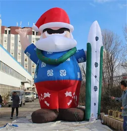 Babbo Natale gonfiabile gigante con lo snowboard per il fornitore di gonfiabili per decorazioni per eventi sul palco di Natale LED 2019 Liquidazione della parata del nightclub4886831