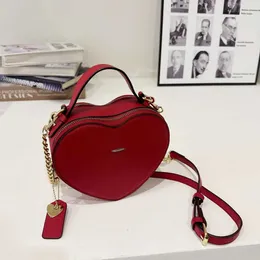 Hjärtformade kvinnors väskor klassiska designer axelväskor dam mode tygväska kärlek hjärtpåse söt rand crossbody väskor handväska 240111