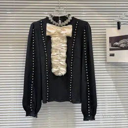 Damesblouses 2024 lente zwarte shirts dames klassieke stijl geplooide vlinderdas kleur botsing ontwerp elegante trui blouse mujer