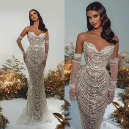 Luxury Pearl Mermaid Bröllopsklänningar Stropplösa brudklänningar Beading Tassel -applikationer Se genom Illusion Sweep Train Robe Brud Dresses