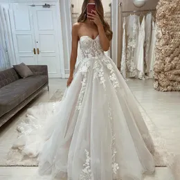 Princess Tulle A Line Wedding Dresses Lace Appliques Sweetheart Neck Sleeveless Corset Romantic Bridal Gowns Chapel Train Boho Bride Dress 2024