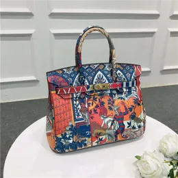 Borse firmate Borse di moda di lusso Pittura a colori di moda Graffiti Strato superiore Pelle bovina Modello litchi Borsa a spalla singola Diagonale Borsa da donna portatile in pelle