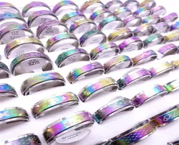 Topes 100pcs çok paslanmaz çelik spin bant halkaları dönebilir çok renkli lazer baskılı karışım desenleri moda mücevher spinner parti 3566618